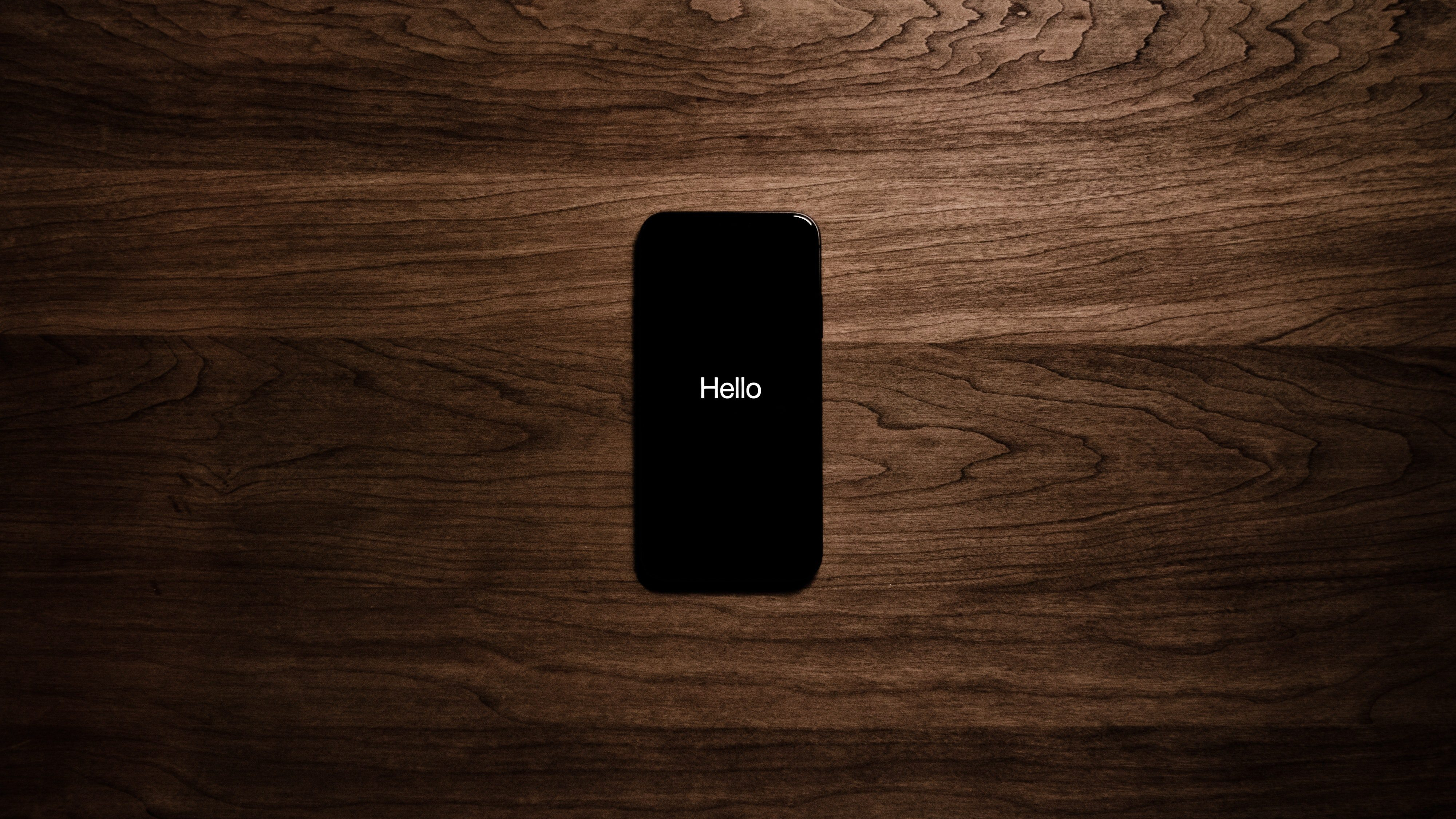 smartphone-alone-on-the-table-says-hello
